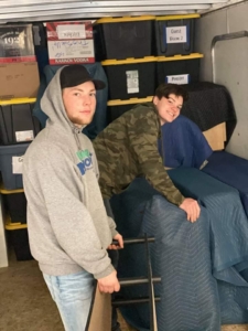 Movers in the back of the truck