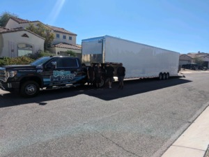 Unique Movers truck and trailer