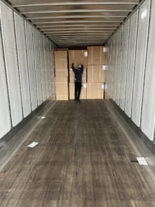 Unique Movers helping move cabinets for a Little Falls, MN apartment complex