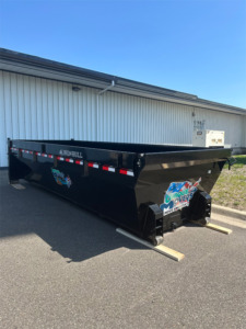 Unique Movers roll off dumpster